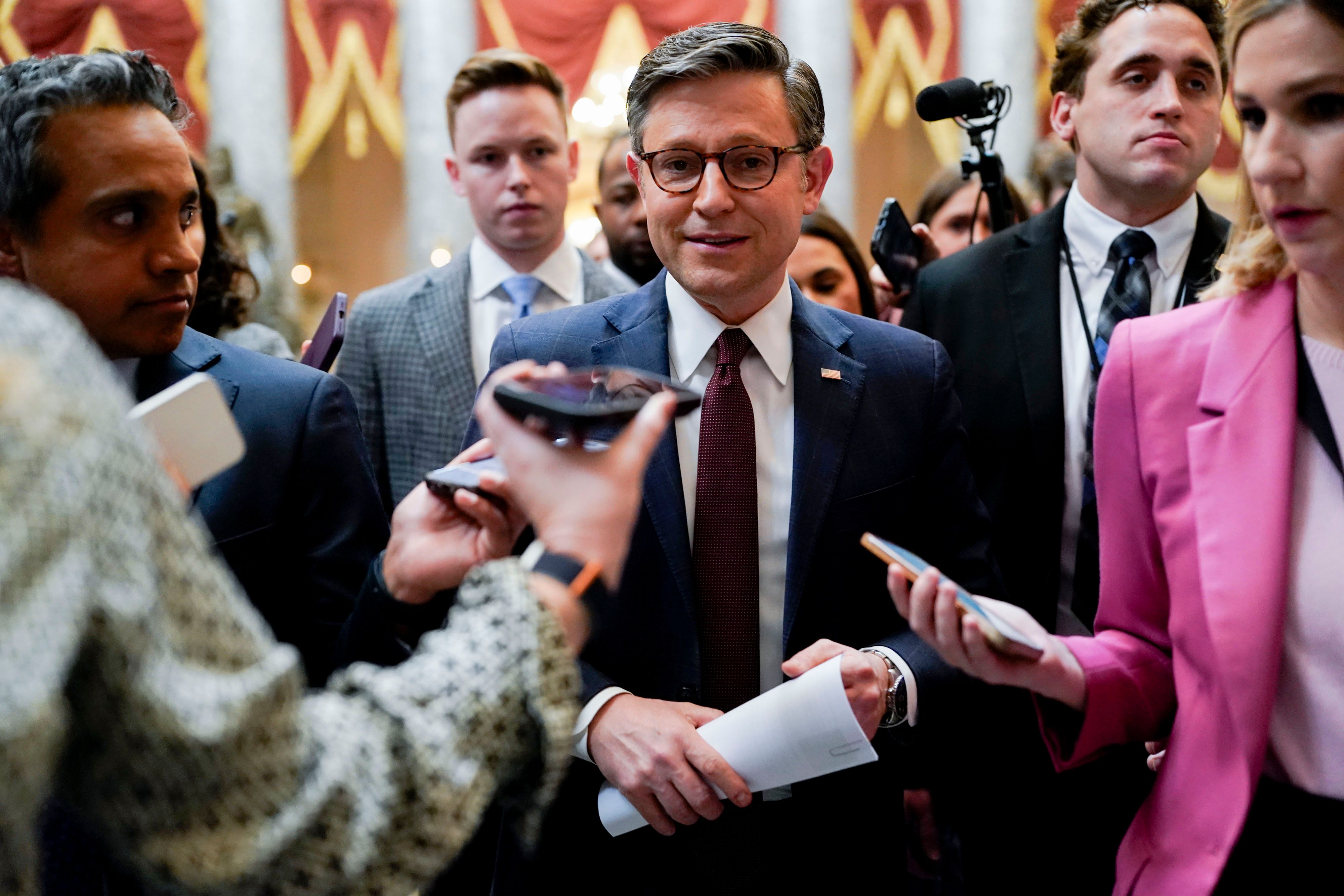 Speaker Mike Johnson (R-La.) speaks to reporters in the Capitol yesterday.