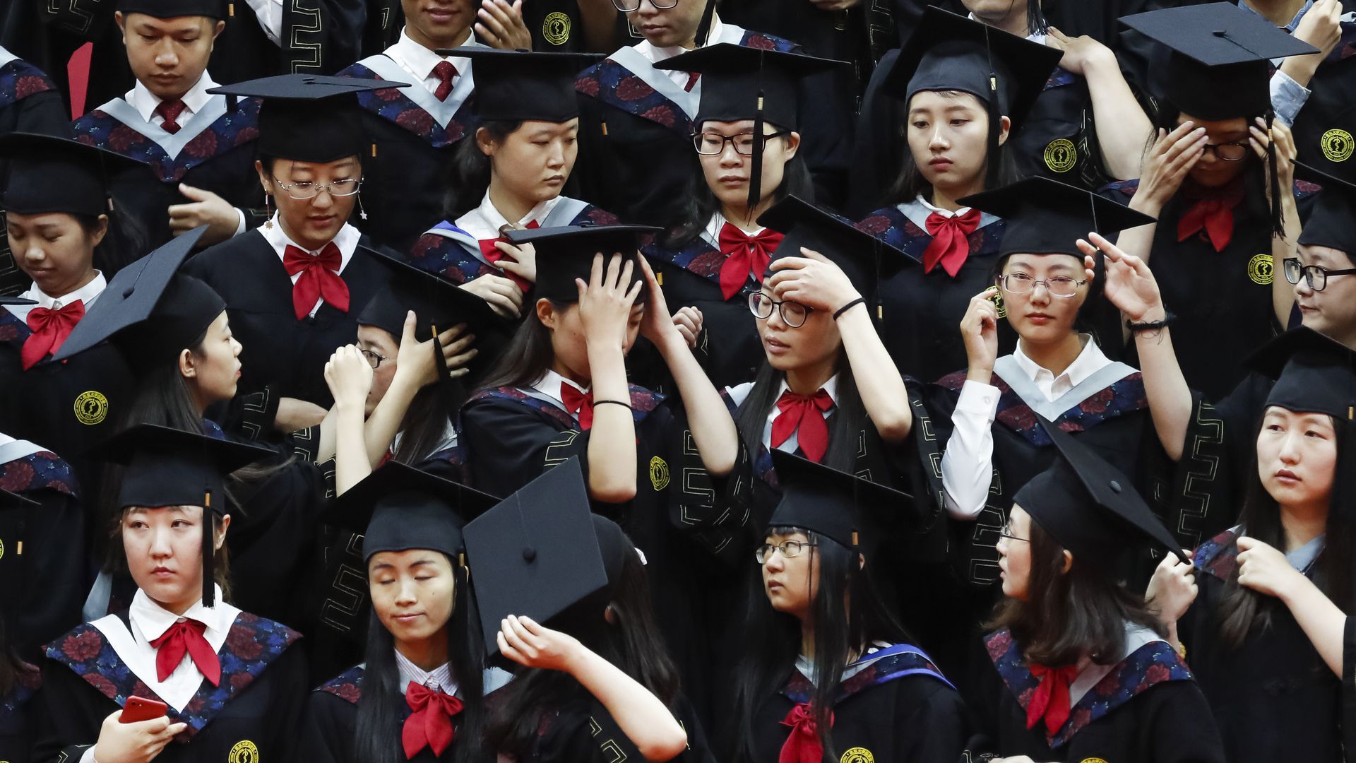 Students graduating university from Peking University.