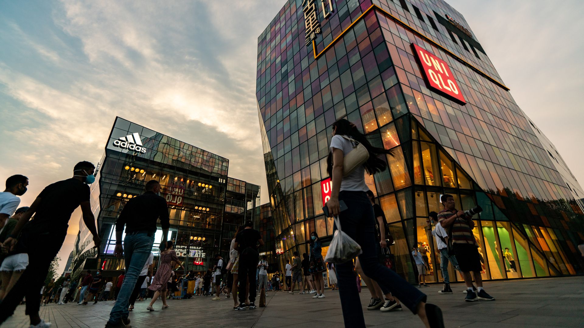 People shopping in Beijing on June 16.