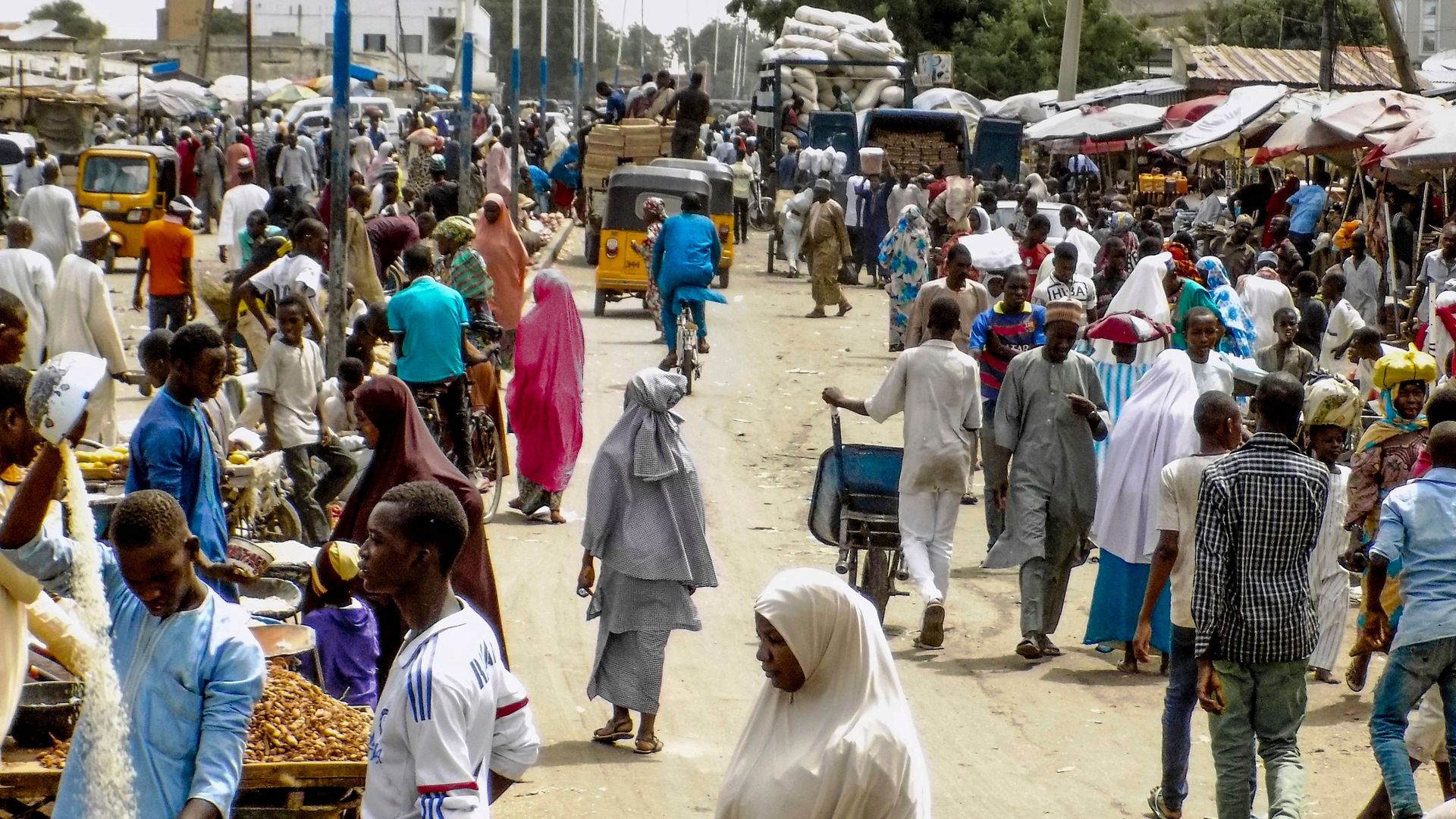 People at a market in Nigeria