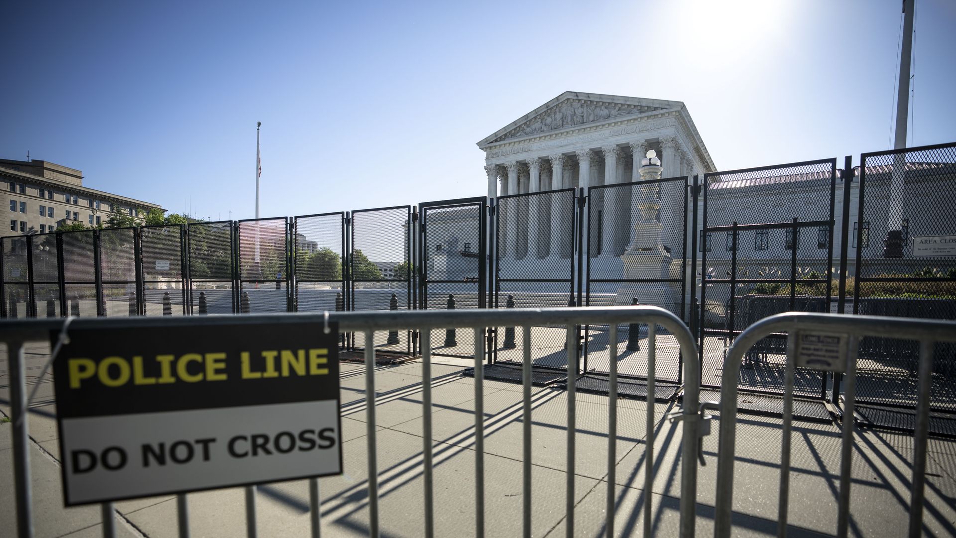 Photo of police fencing in front of the Supreme Court building