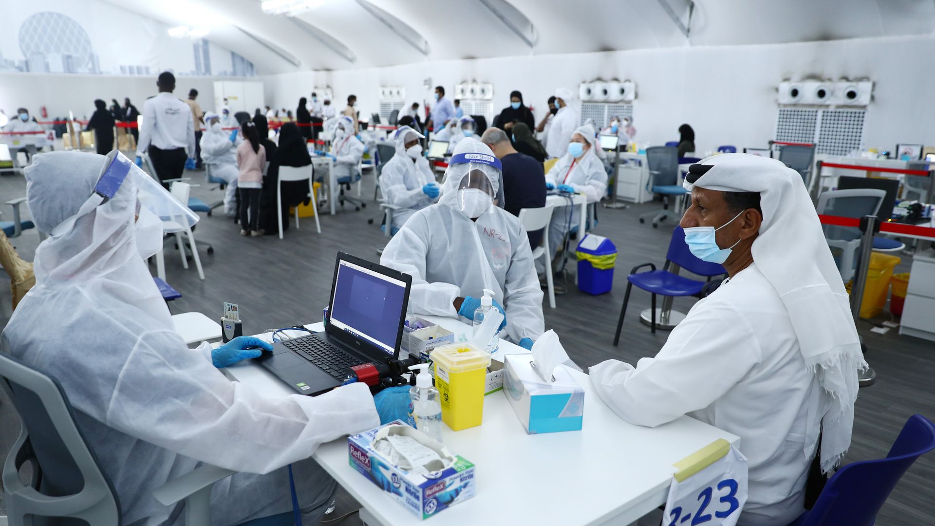 A man waits for his test results after being tested with Laser-based DPI technology at a testing center at the Dubai-Abu Dhabi border on August 10, 2020 in Abu Dhabi, United Arab Emirates.
