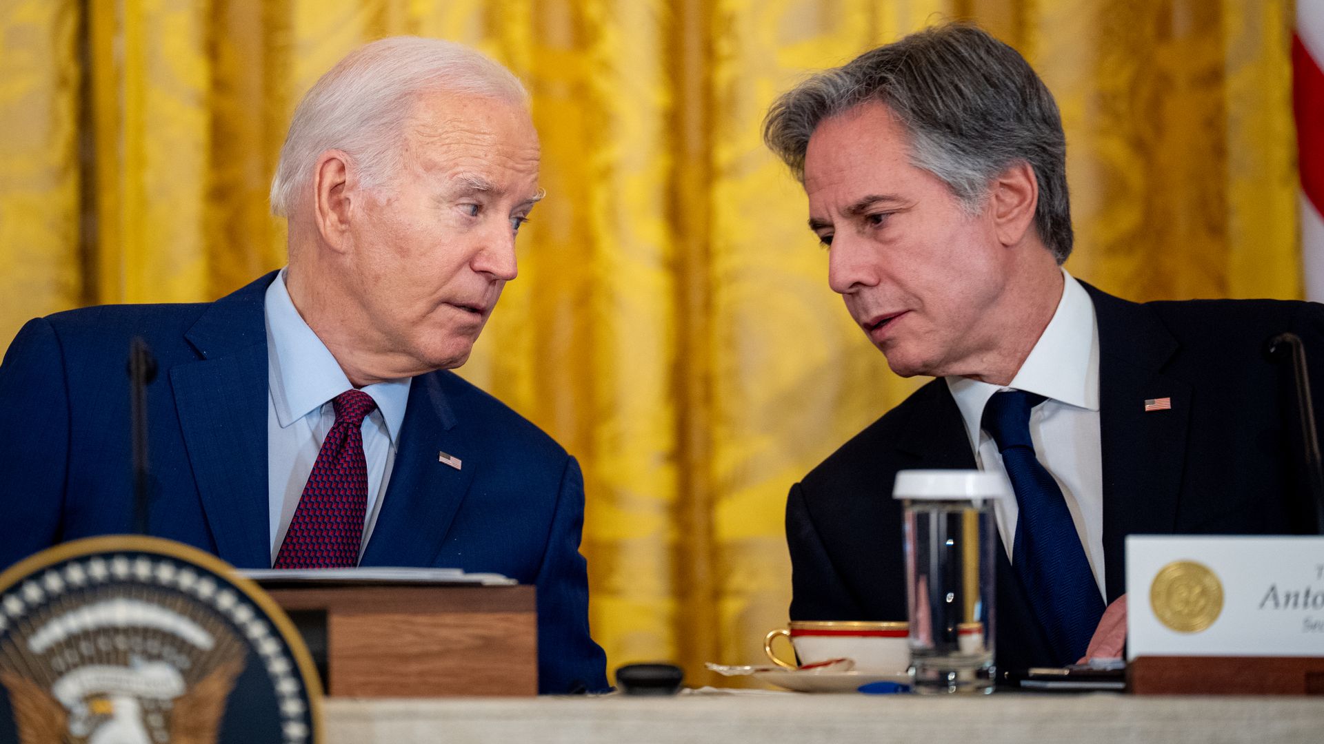 U.S. President Joe Biden speaks with Secretary of State Antony Blinken (R) during a trilateral meeting with Japanese Prime Minister Fumio Kishida and Filipino President Ferdinand Marcos in the East Room of the White House on April 11, 2024 in Washington, DC. (Photo by Andrew Harnik/Getty Images)