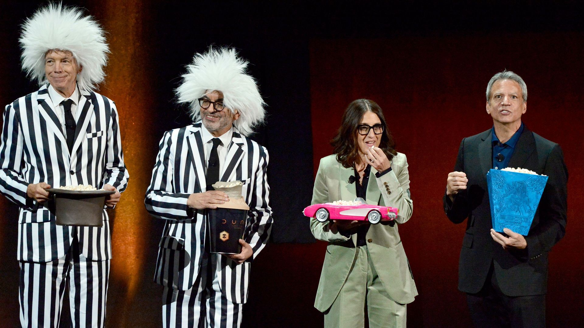 Andrew Cripps, President, International Distribution, Warner Bros. Studios, Jeff Goldstein, EVP, Domestic Theatrical Distribution, Warner Bros. Pictures, Pamela Abdy, Co-Chairperson & CEO, Warner Bros. Film Group and Michael De Luca, Chairperson & CEO, Warner Bros. Film Group, speak onstage.