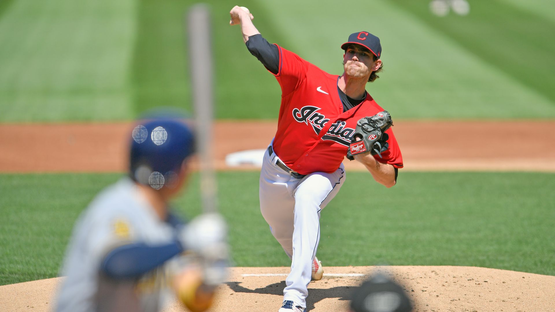 Starting pitcher Shane Bieber #57 of the Cleveland Indians pitches to Keston Hiura #18 of the Milwaukee Brewers during the first inning at Progressive Field on September 06, 2020 in Cleveland, Ohio