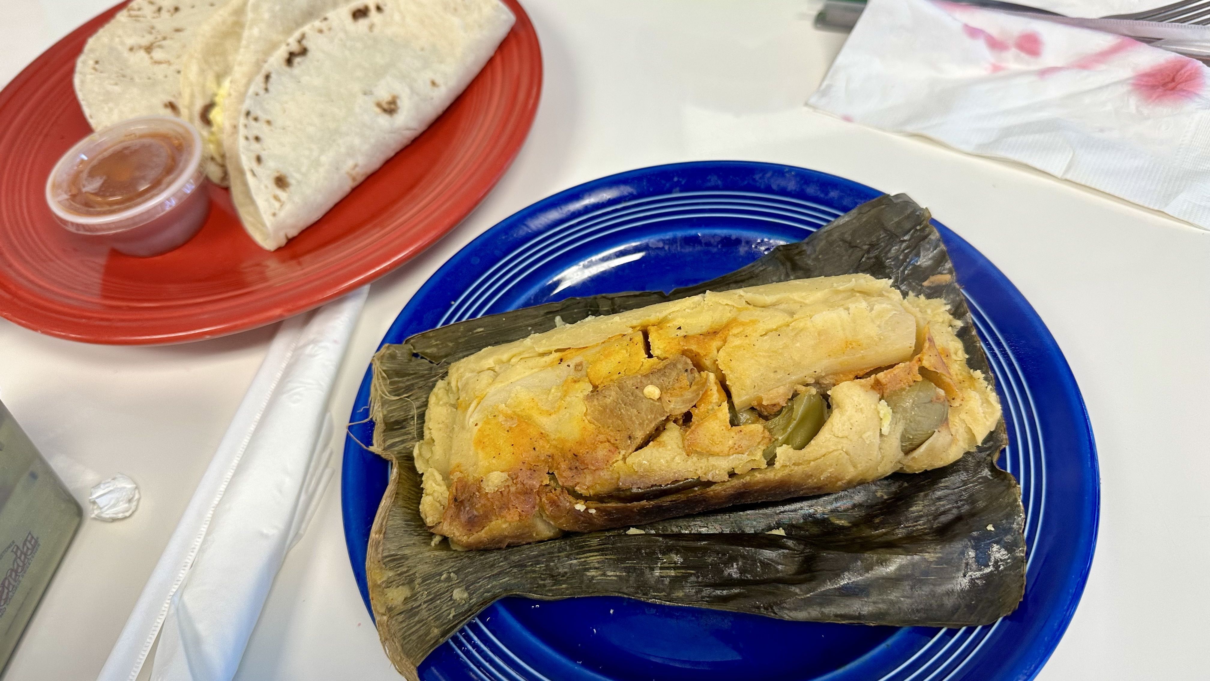 Photo shows a tamale.