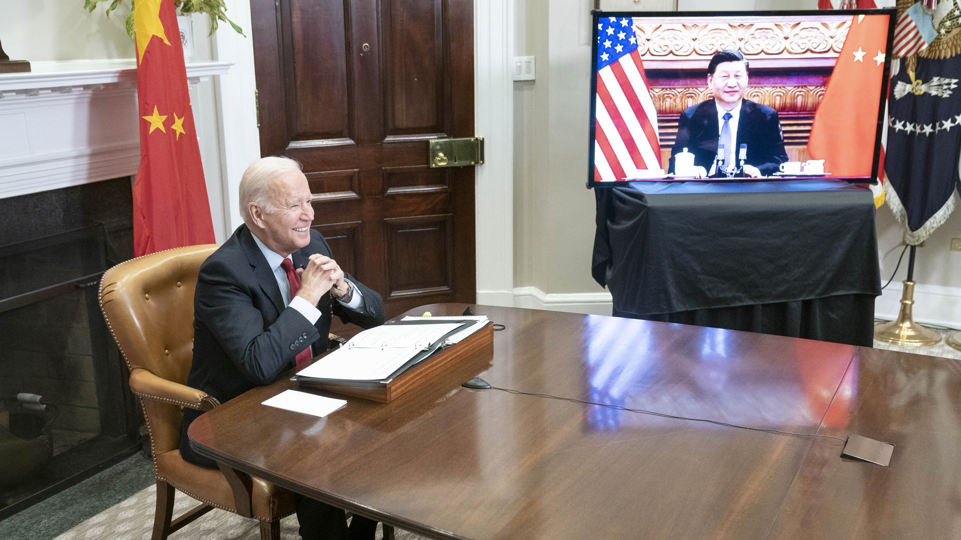 U.S. President Joe Biden reacts while meeting virtually with Xi Jinping, China's president, in the Roosevelt Room of the White House in Washington, D.C., U.S., on Monday, Nov. 15, 2021. 