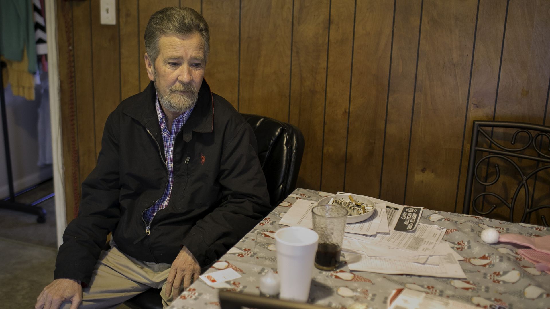 Leslie McCrae Dowless sits in his kitchen in Bladenboro, NC.