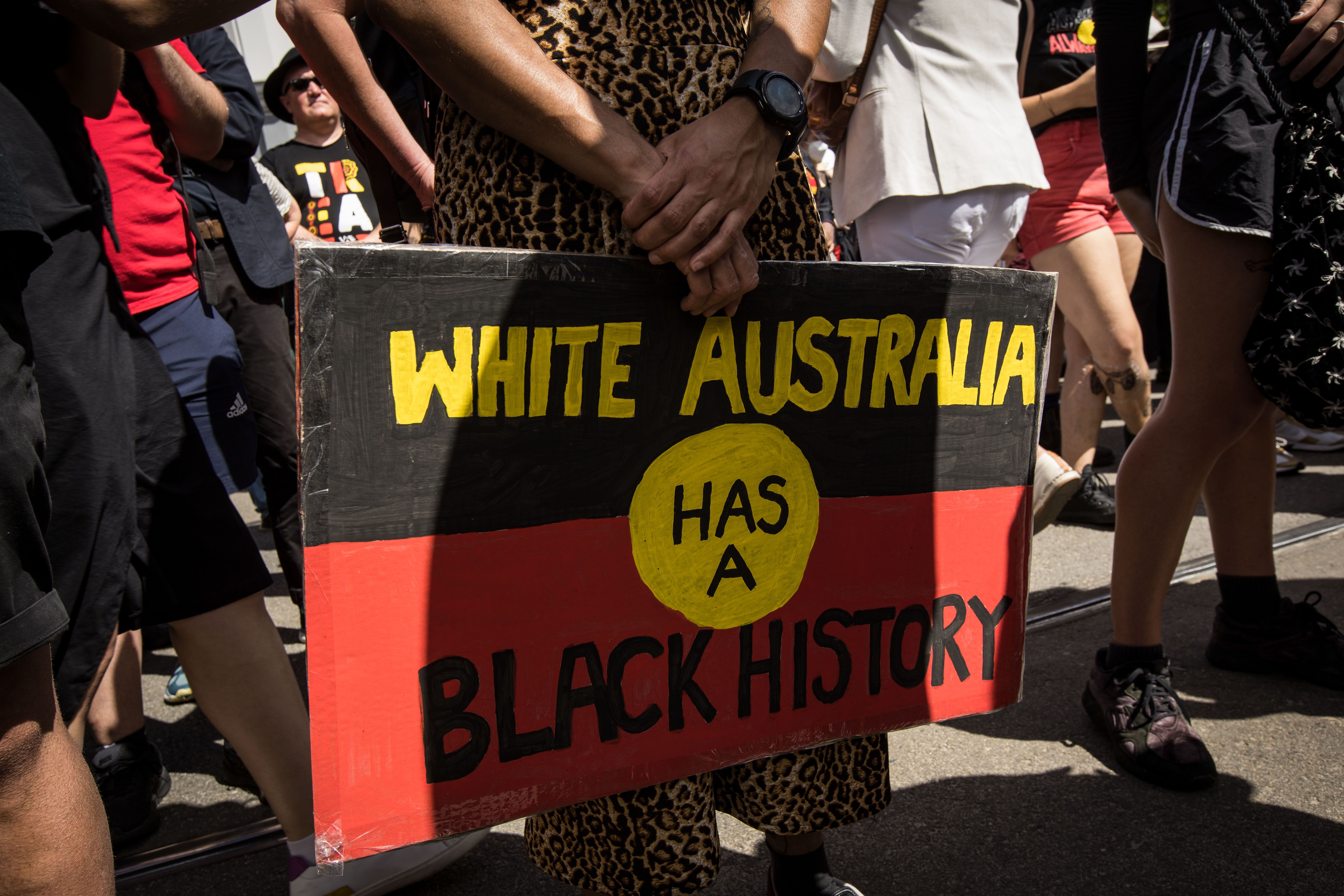 Participants gather at the steps to Parliament house before the Invasion Day rally on January 26, 2023 in Melbourne, Australia. 