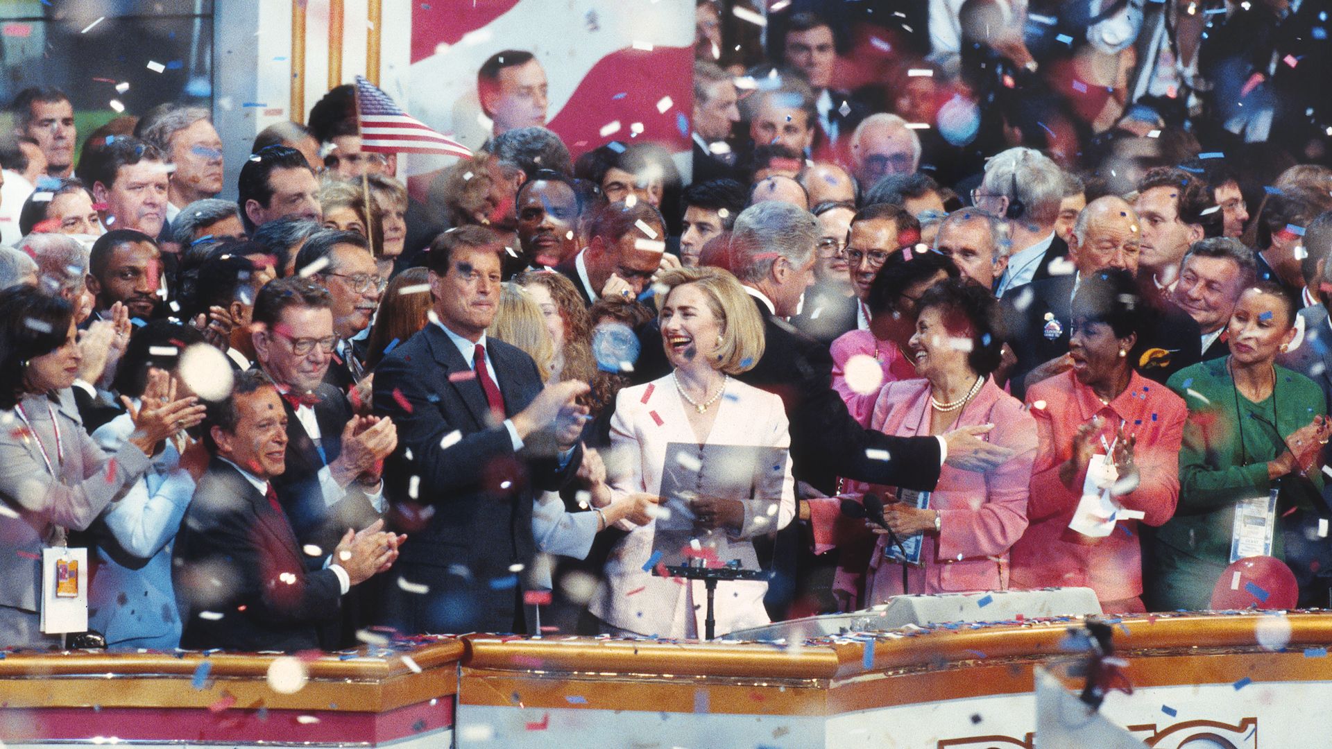 Photo of people on stage at a convention 