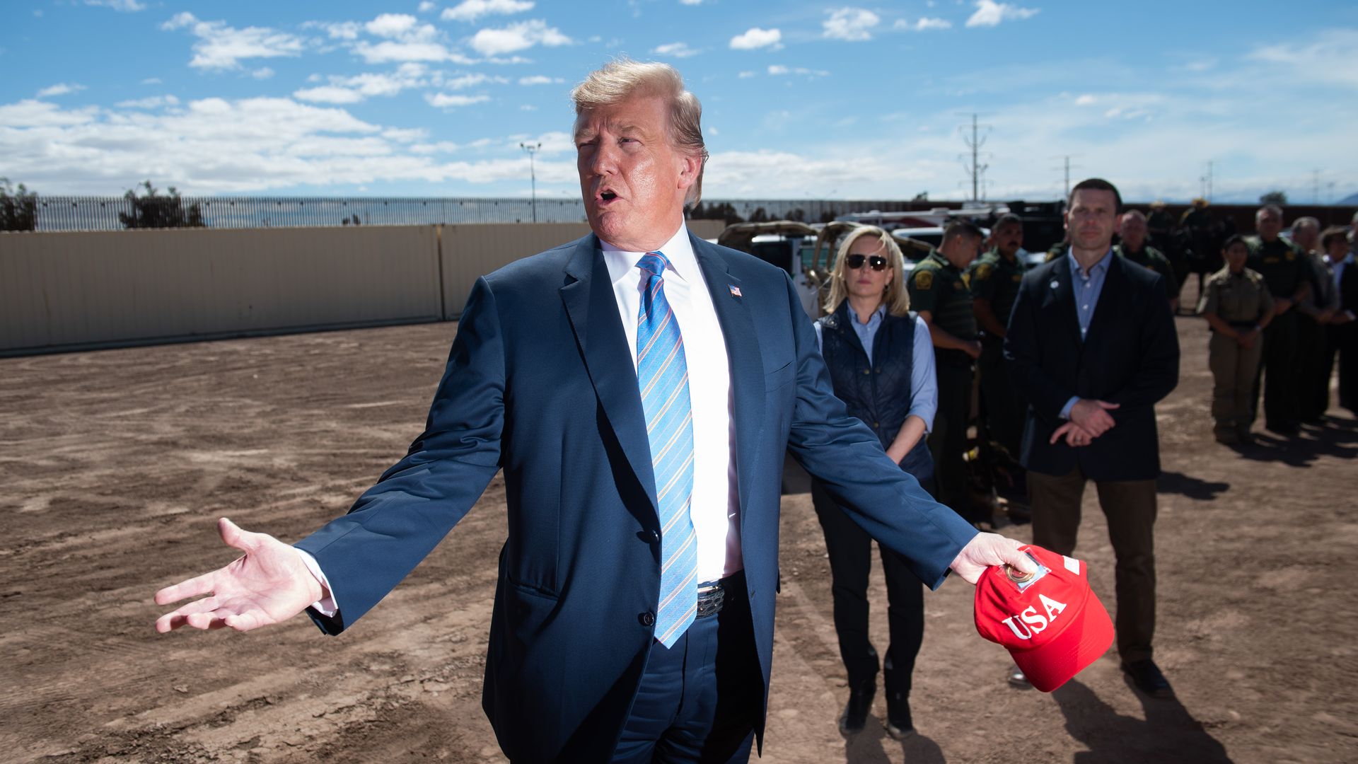 President Donald Trump tours the border wall between the United States and Mexico in Calexico, California, April 5.