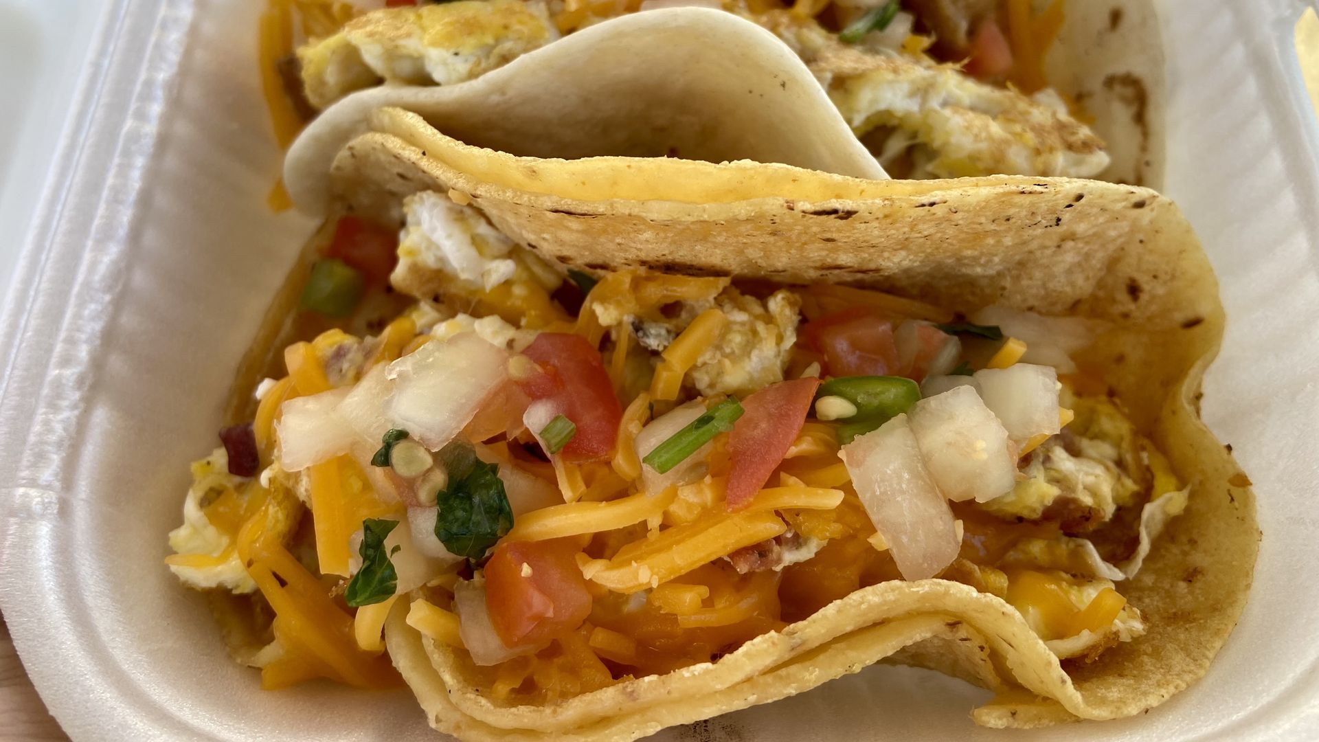 Two delicious looking breakfast tacos