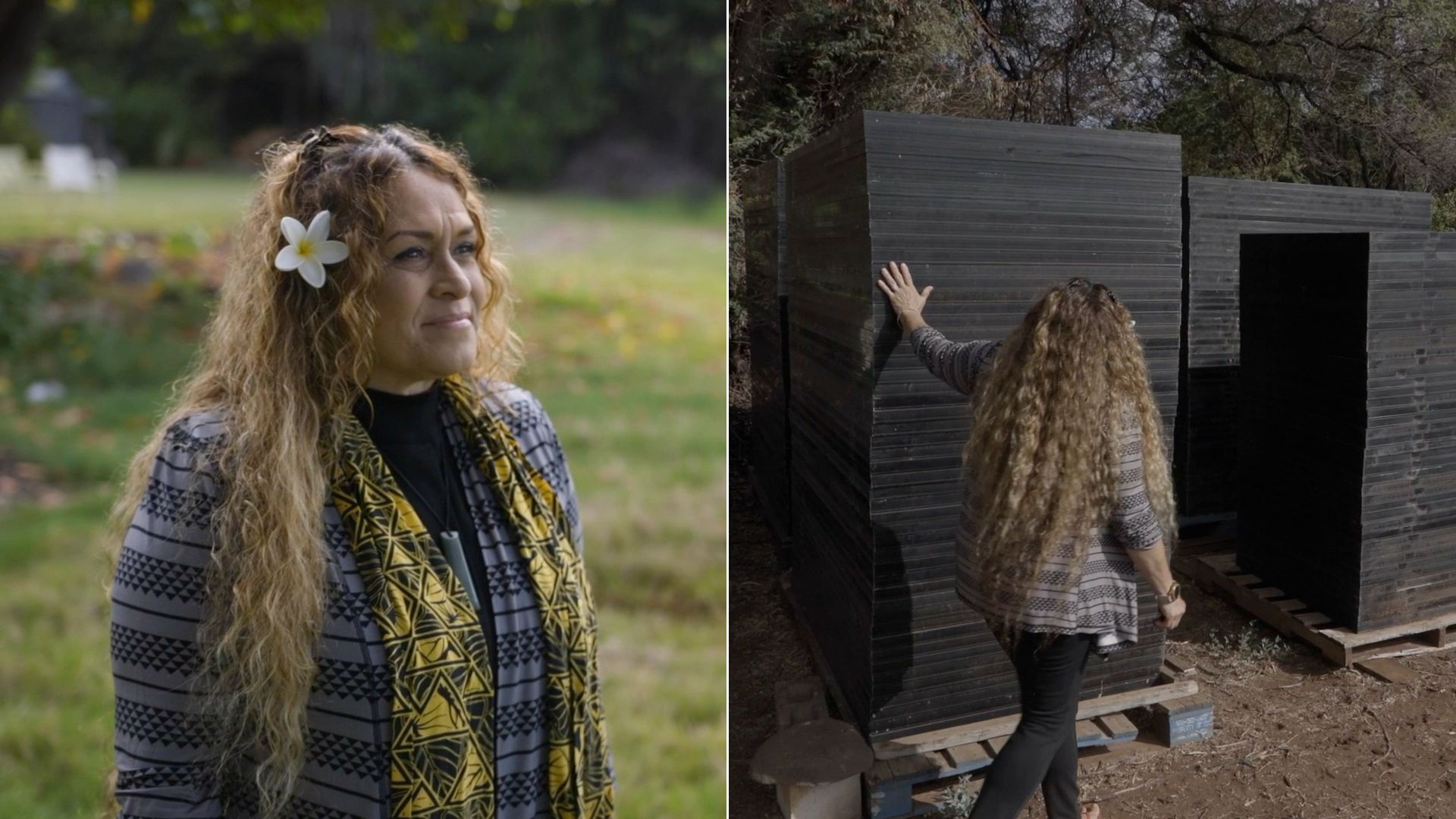 A woman stands in front of a stack of used solar panels