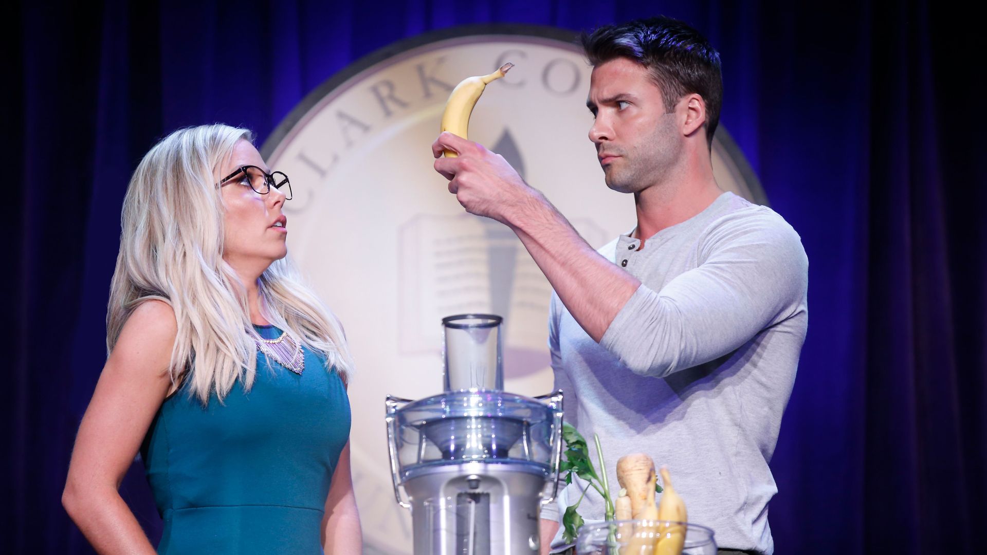 People on stage with a banana