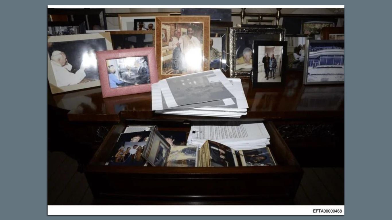 DOJ defends removing Trump photo from Epstein files