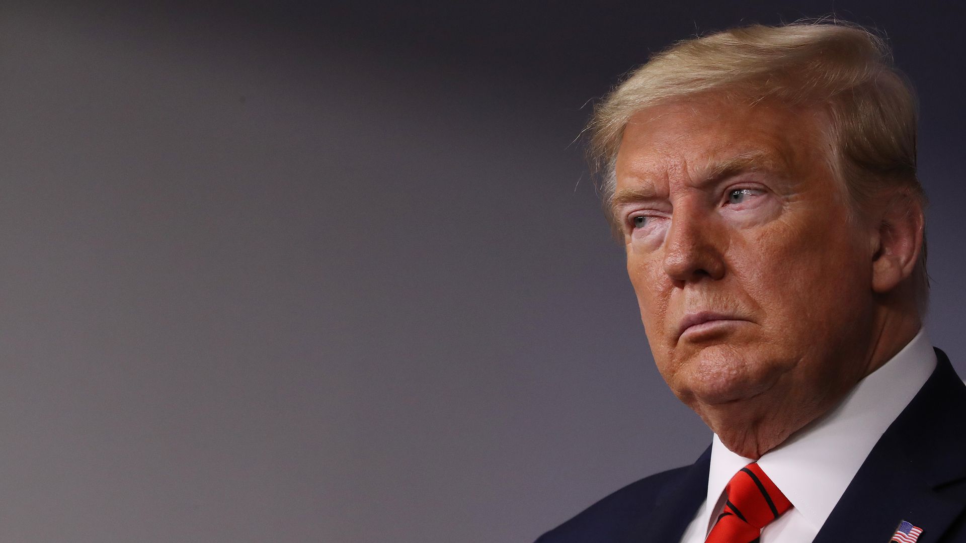 Headshot of President Trump speaking to reporters
