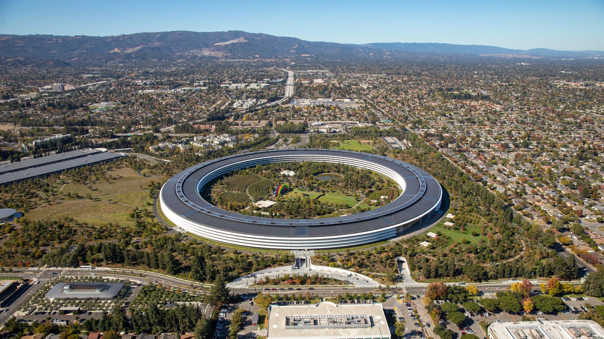 The Apple Park campus stands in this aerial photograph taken above Cupertino, California, U.S., on Wednesday, Oct. 23, 2019.