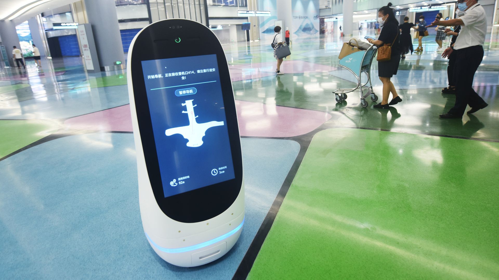    An intelligent navigation robot navigates passengers inside Terminal T4 of Xiaoshan International Airport in Hangzhou, Zhejiang Province, China.