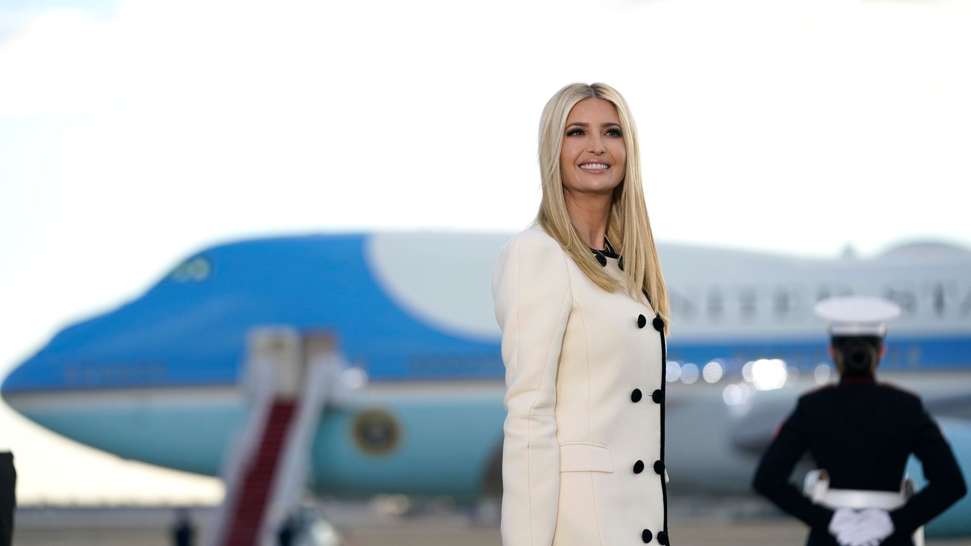 Former first daughter Ivanka Trump is seen standing against the backdrop of Air Force One.