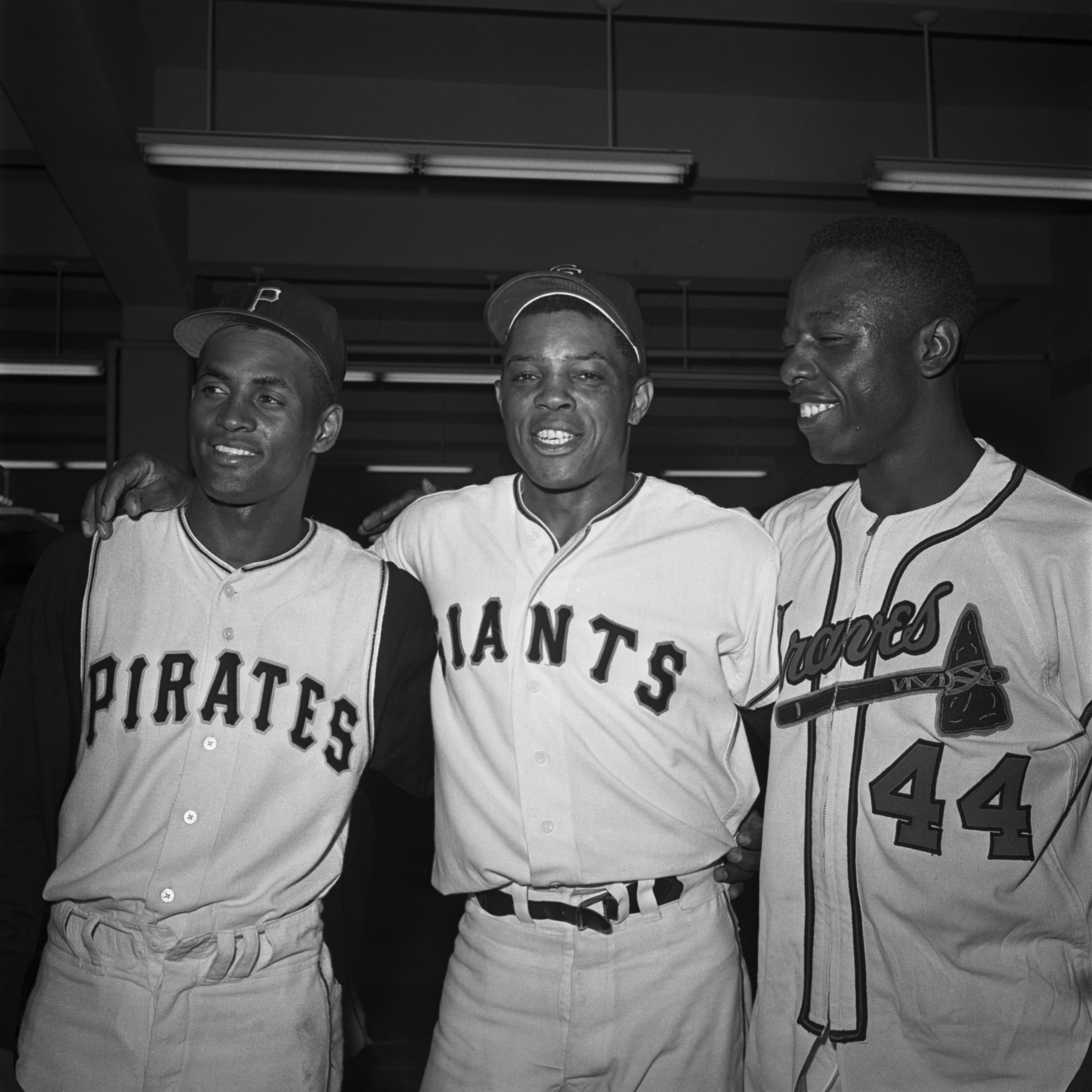 National League stars Roberto Clemente, Willie Mays, and Hank Aaron stand together for a victory portrait after the All-Star Game of 1961 in San Francisco.