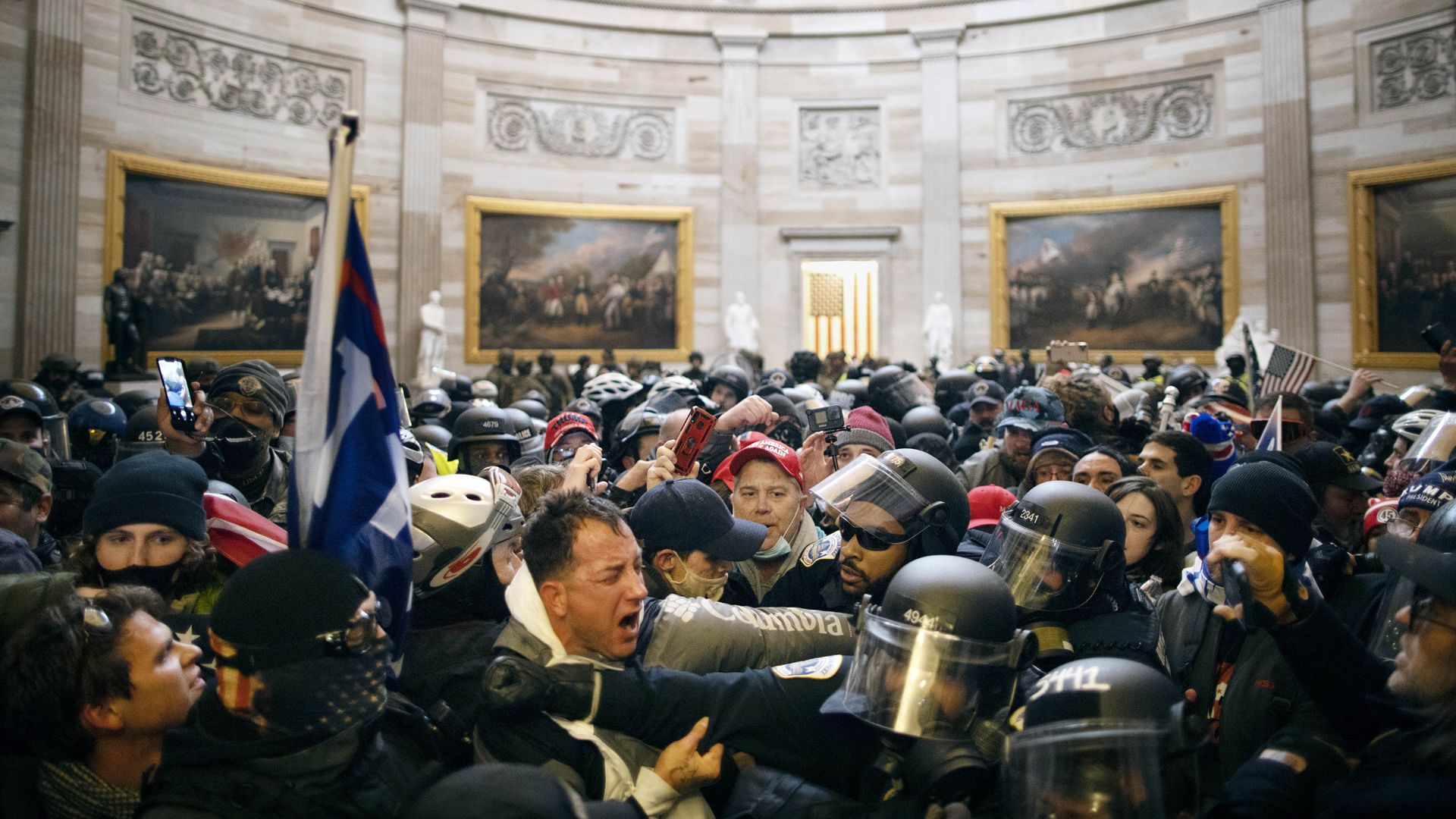 JANUARY 6: Police clash with supporters of US President Donald Trump who breached security and entered the Capitol building 