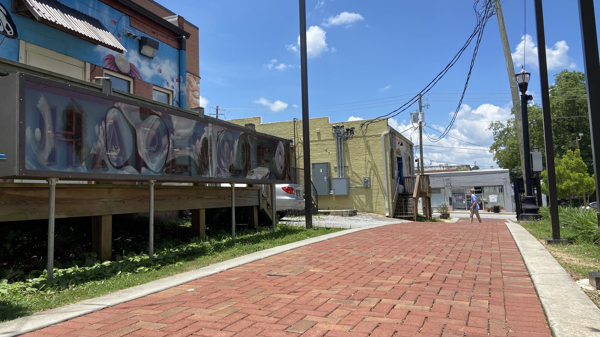 An alleyway turned paved pedestrian pathway in Hapeville