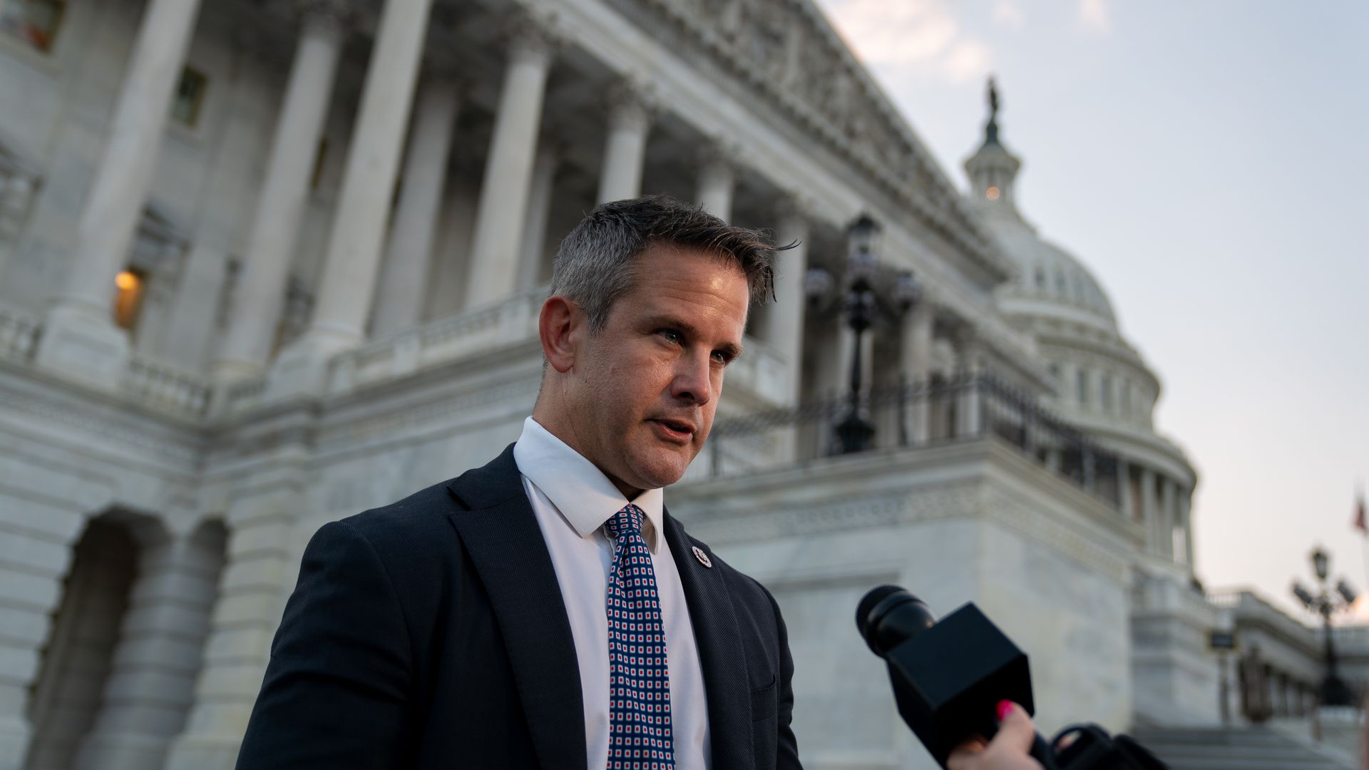 Representative Adam Kinzinger, a Republican from Illinois, speaks to members of the media outside the U.S. Capitol in Washington, D.C., U.S., on Monday, Aug. 23, 2021.