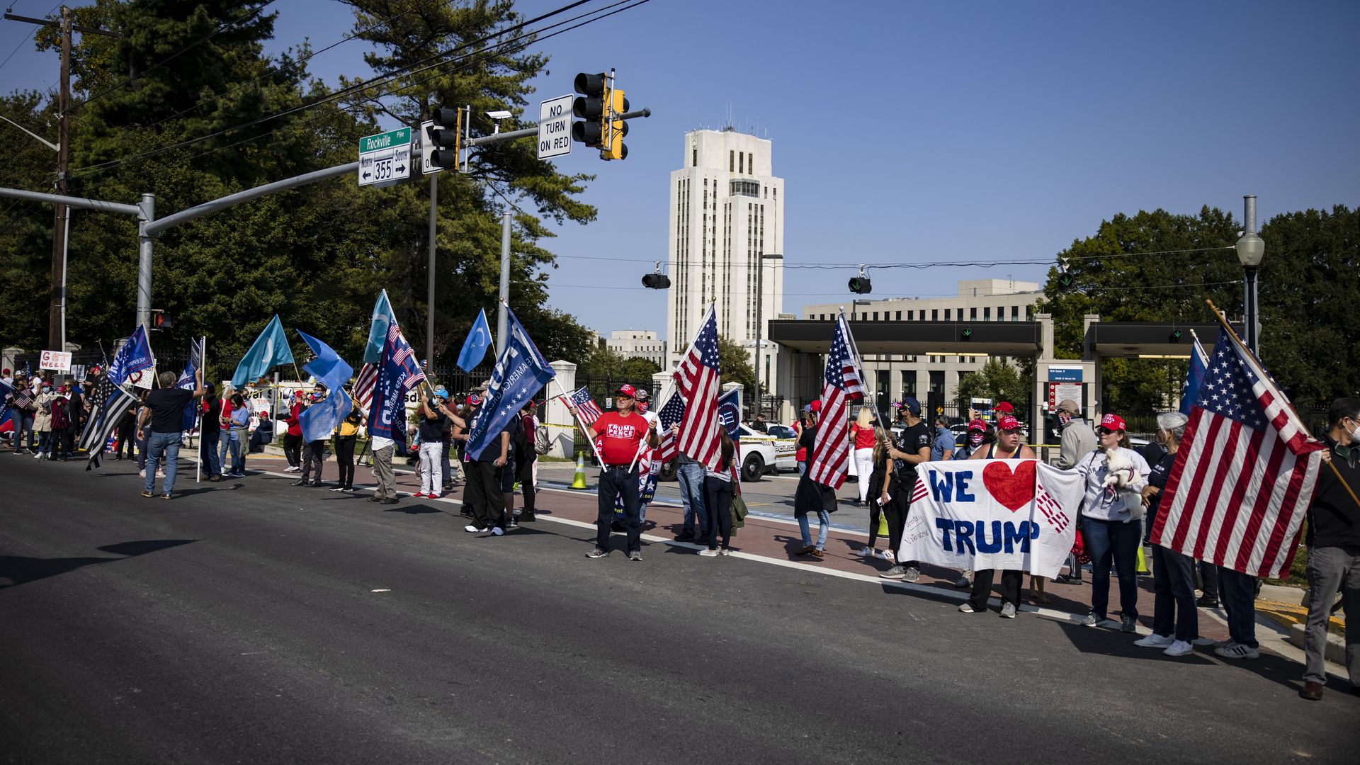 Supporters of President Donald Trump gather outside of Walter Reed National Military Medical Center