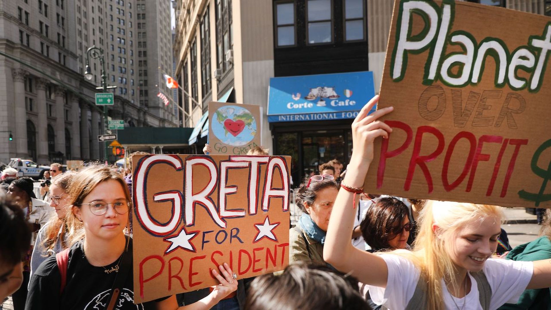 Photo of demonstrators holding a sign at the climate strikes on September 20