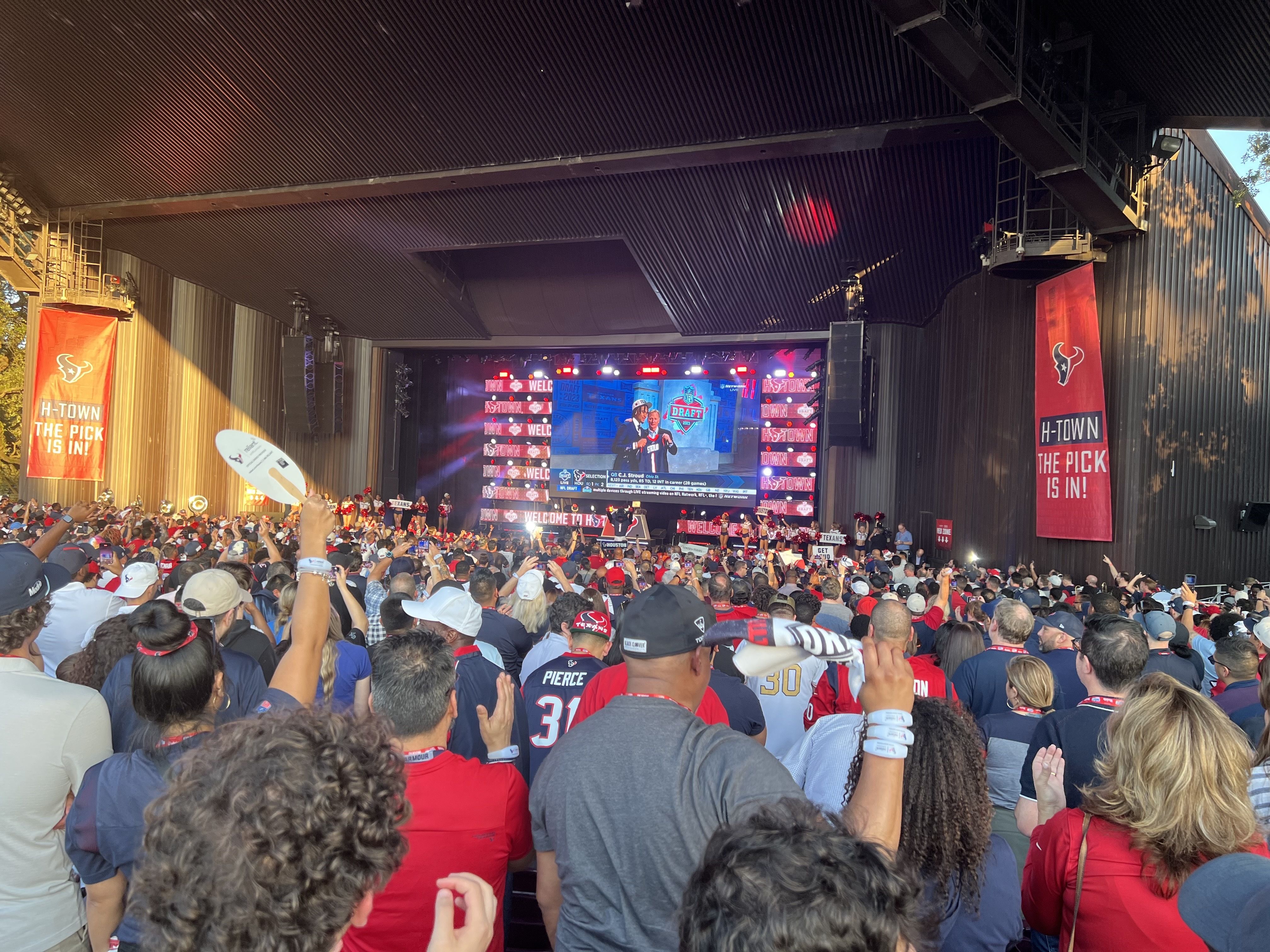 Fans erupt in excitement at Miller Outdoor Theatre at the Texans' draft watch party 