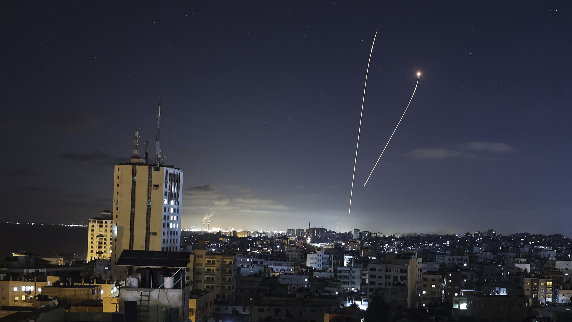 A streak of light appears as Israel's Iron Dome anti-missile system intercepts rockets