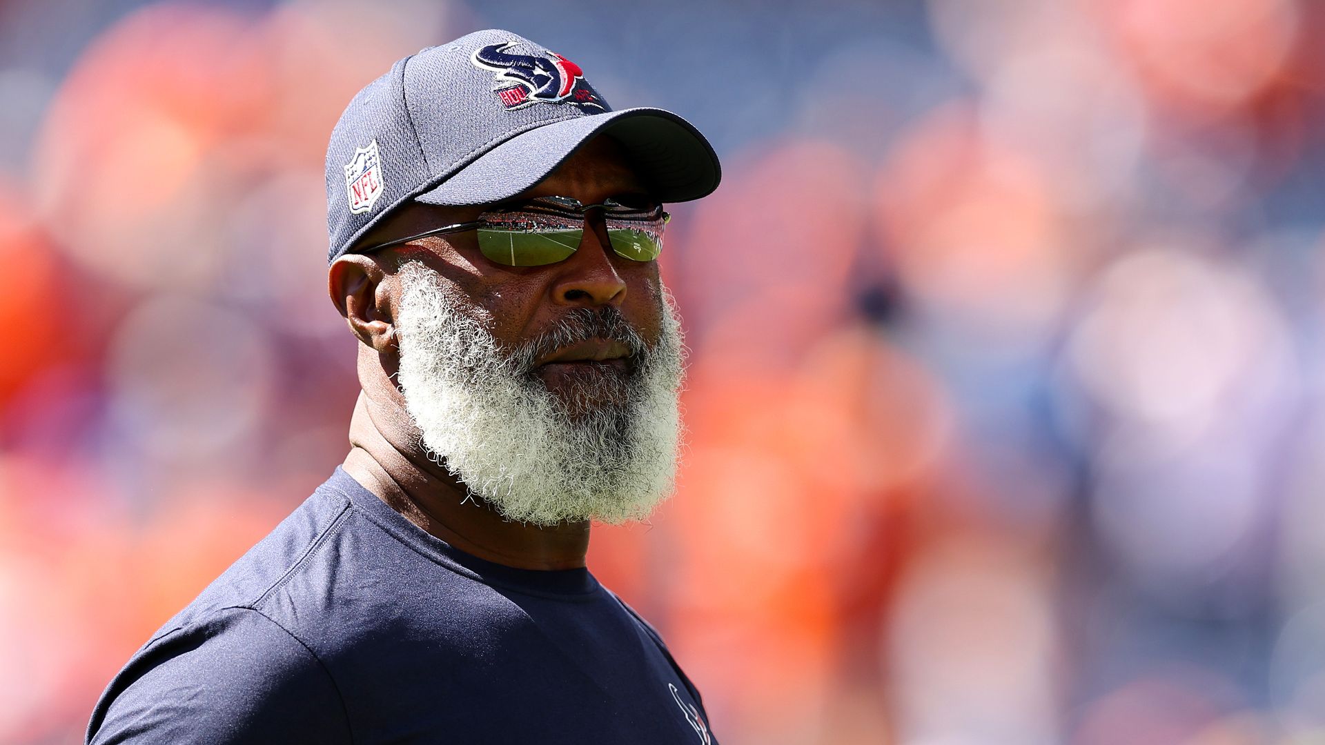 Football coach in a baseball cap 
