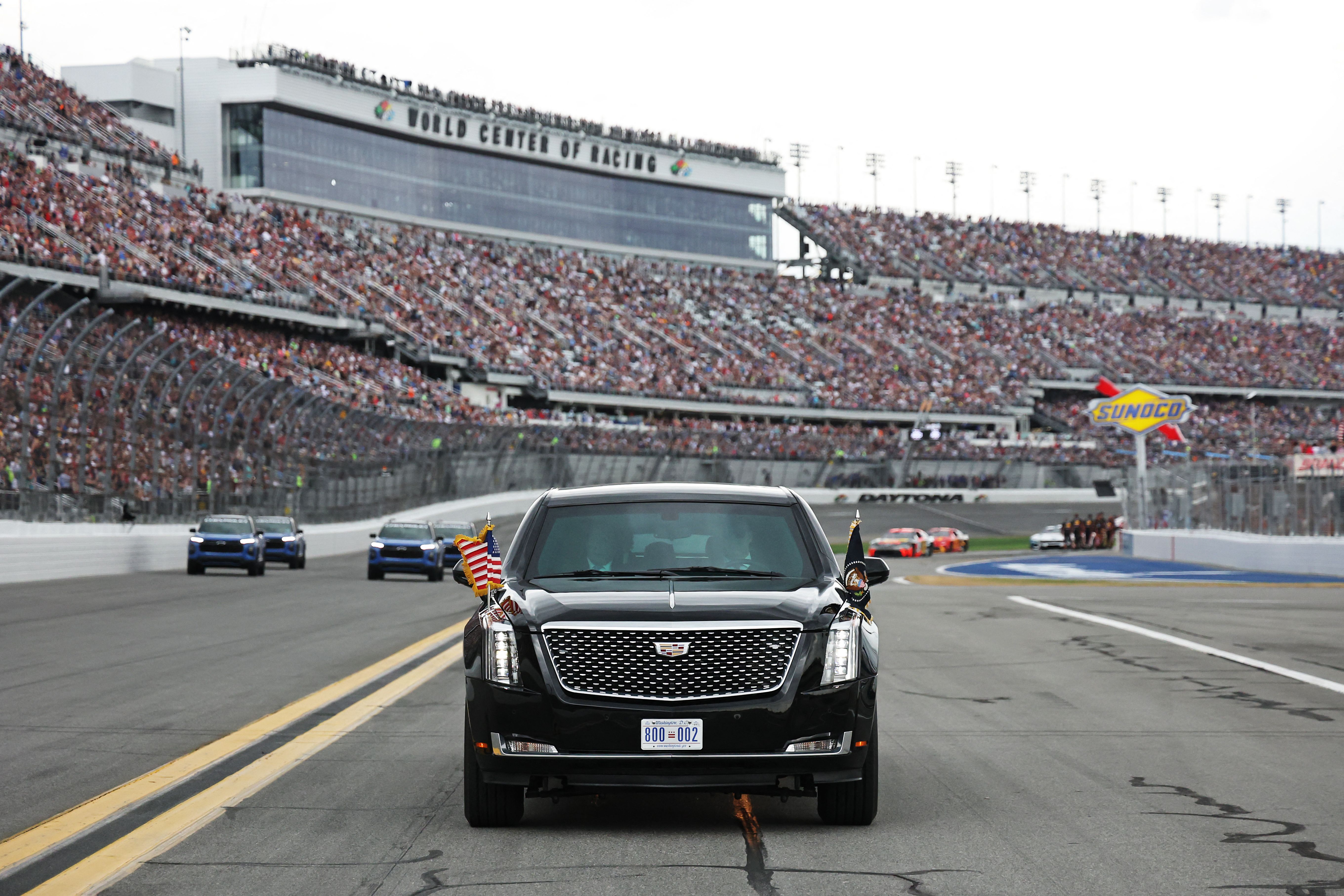 Secret Service drives President Trump around Daytona International Speedway in "The Beast" before the Daytona 500 yesterday.
