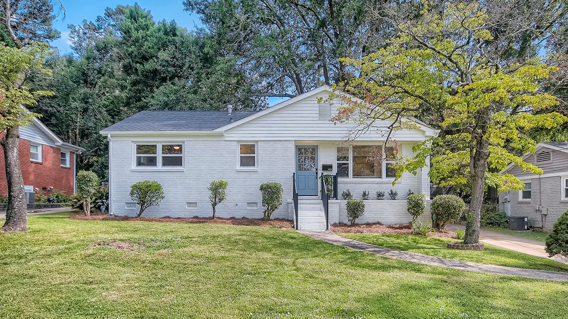 single floor blue house with blue door