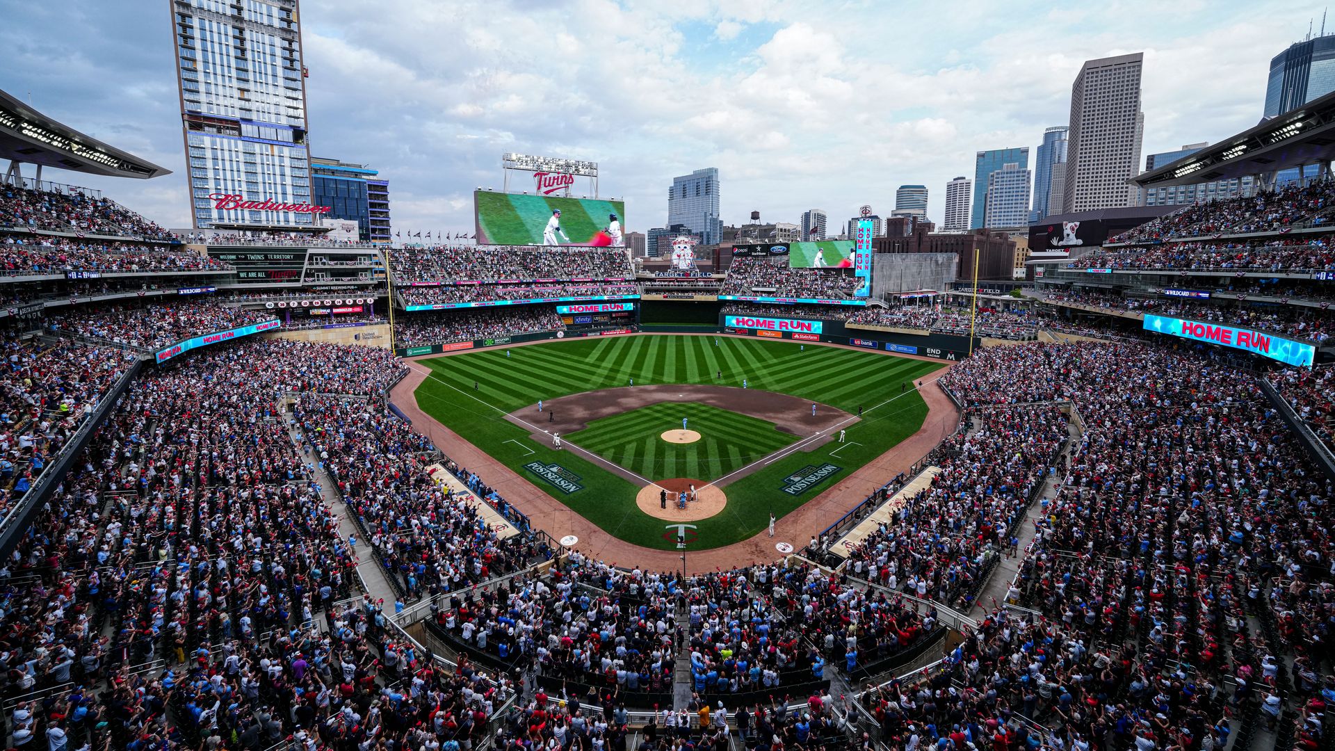 Target Field as seen from behind the batters box, with stands full of fans 