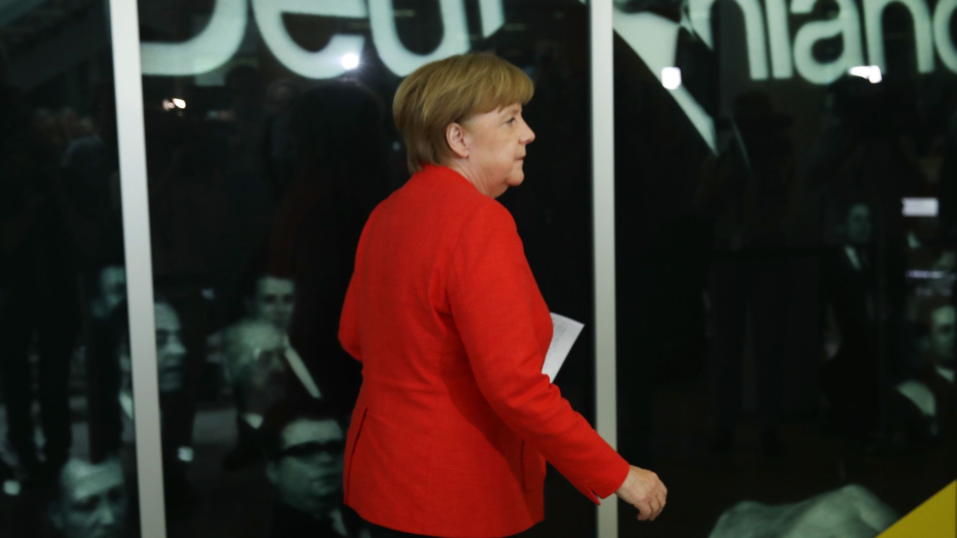 Angela Merkel in a red suit