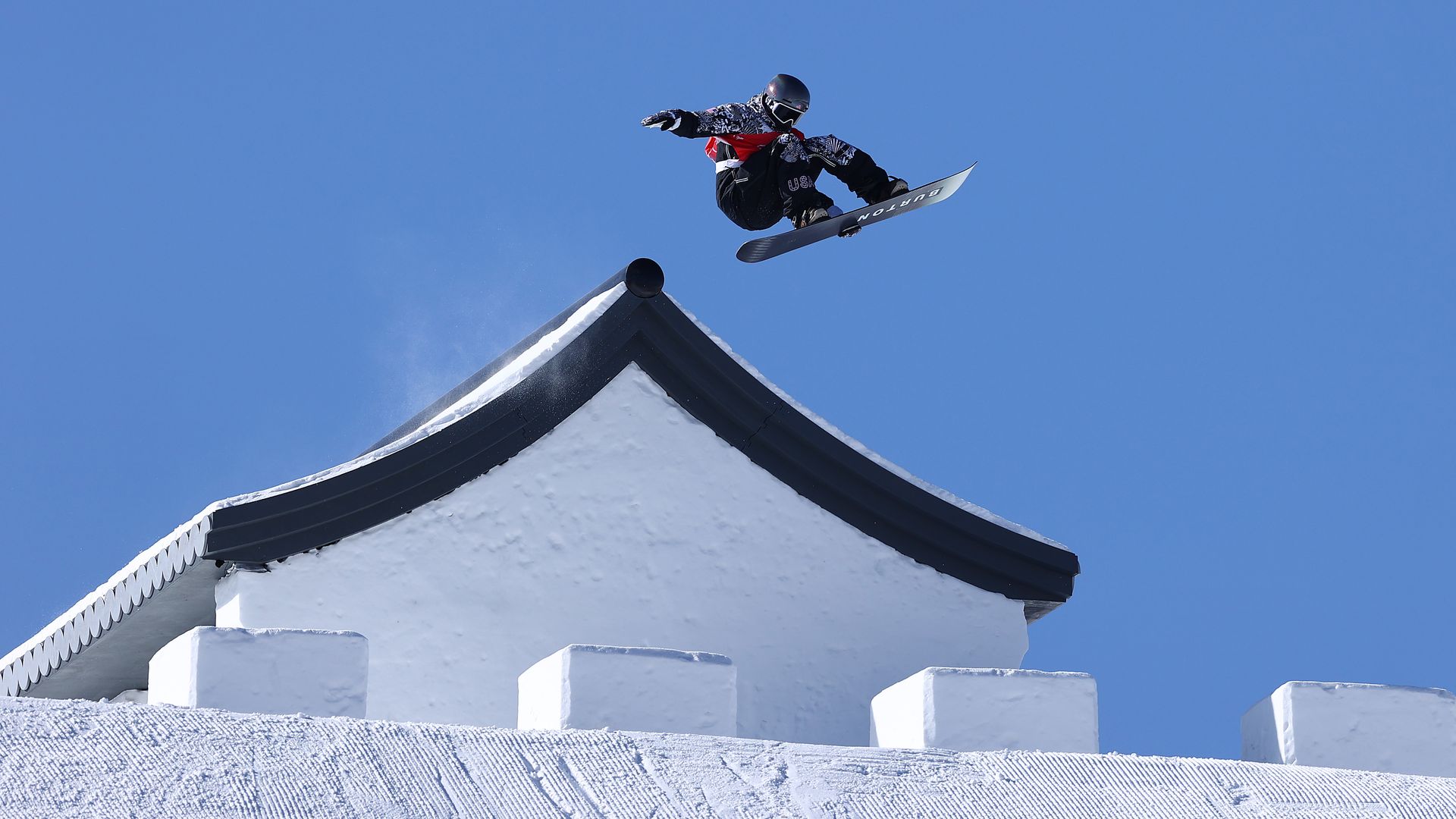 Red Gerard performs a trick during the men's snowboard slopestyle Olympic competition Sunday. Photo: Cameron Spencer/Getty Images