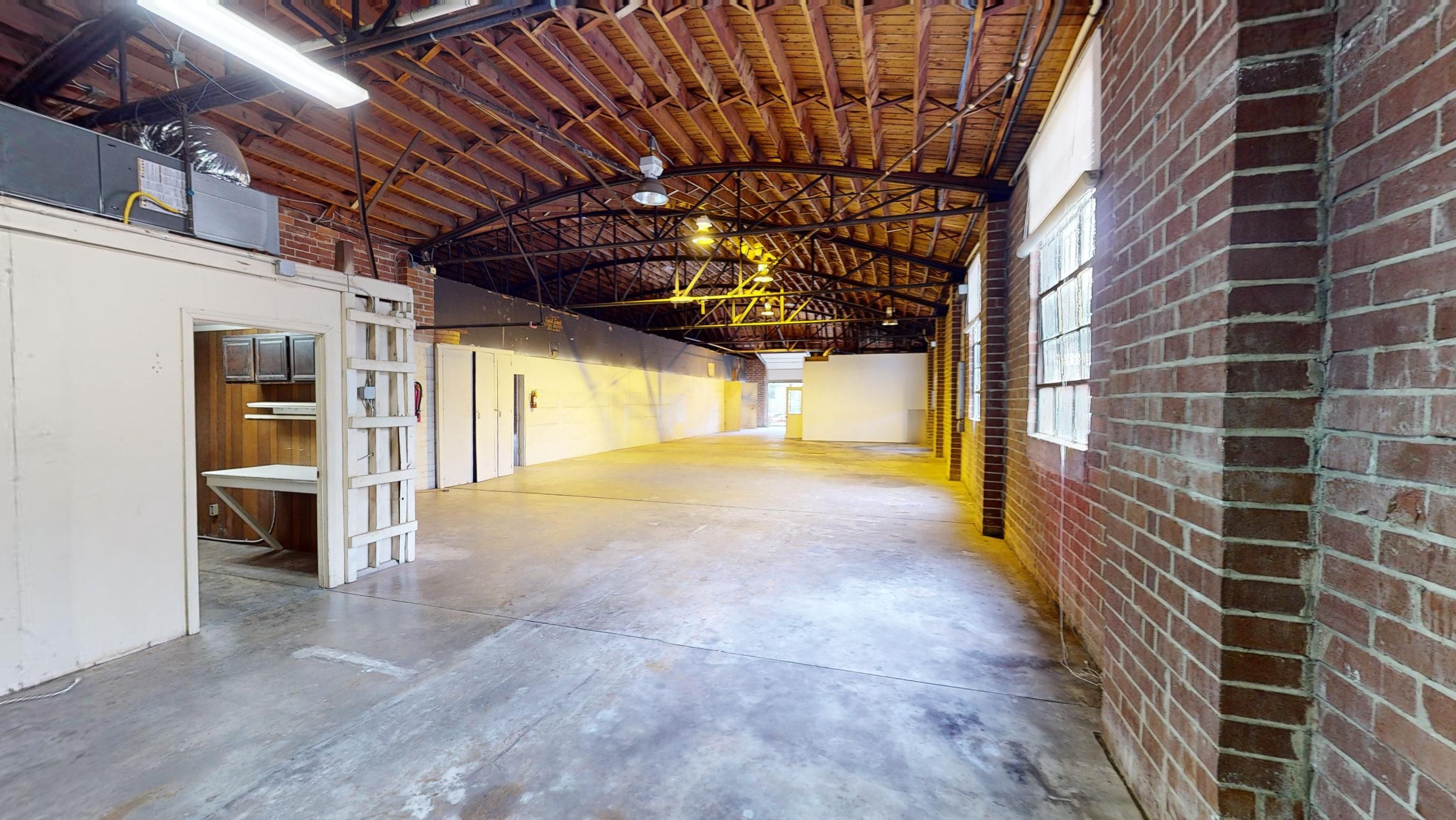 Empty inside building with brick walls