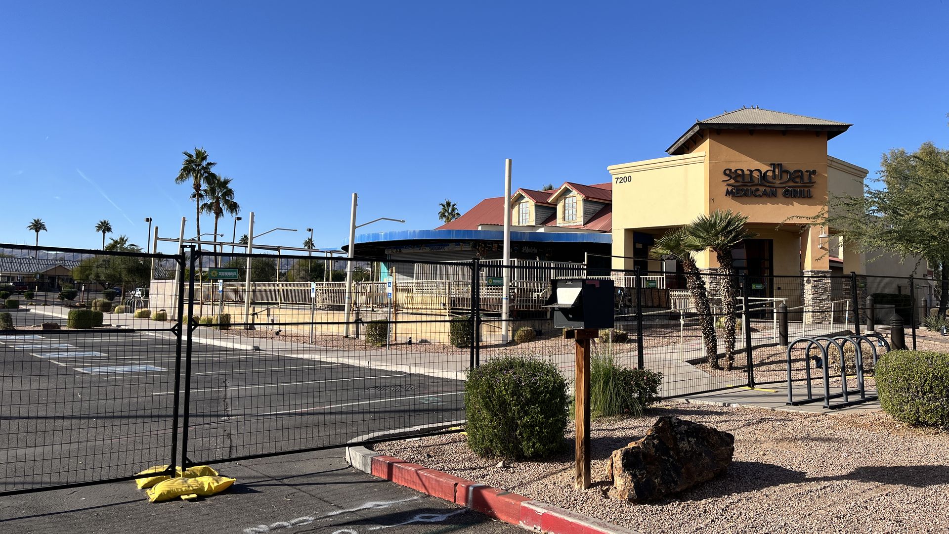 A building with a fence around it.