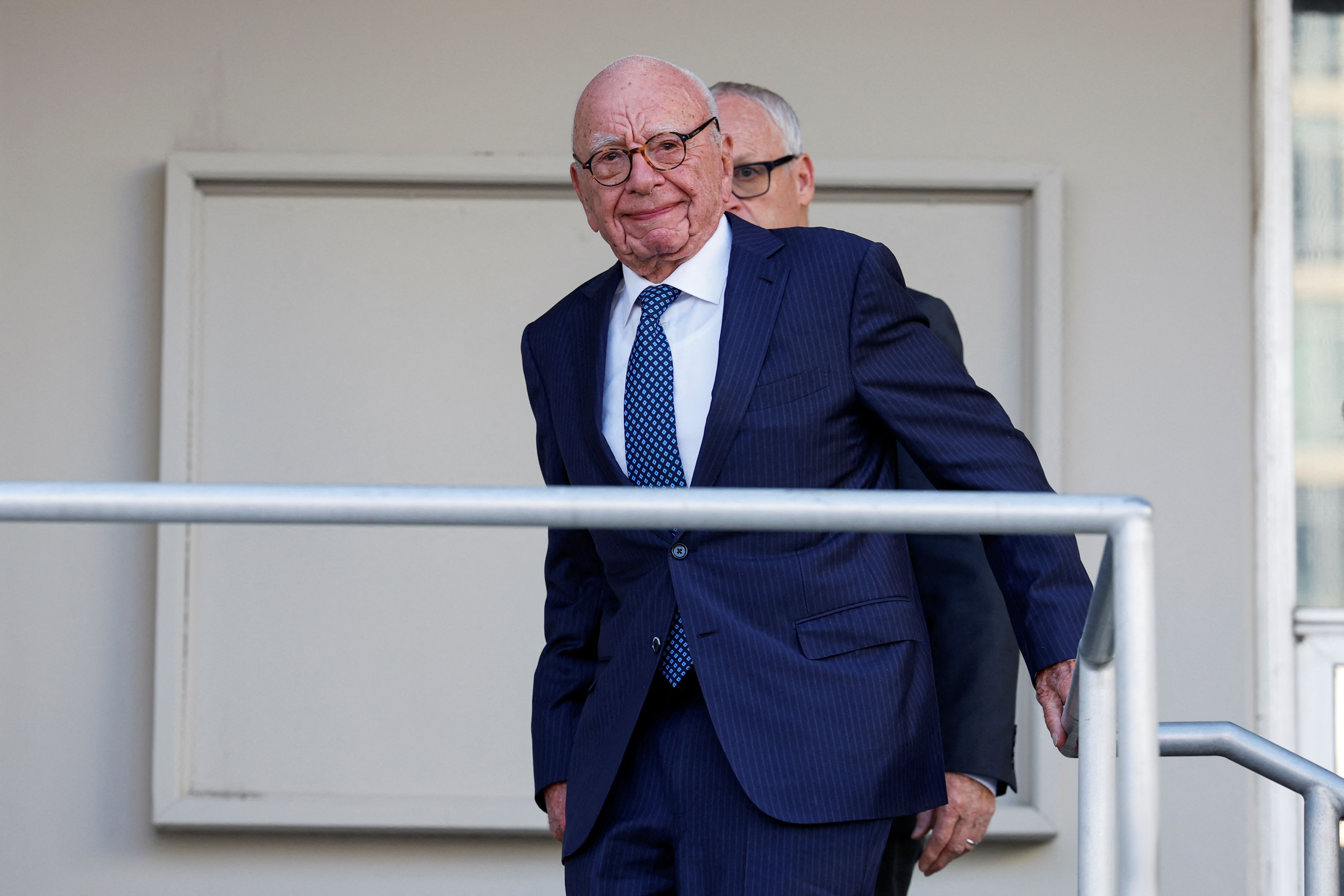 Rupert Murdoch walks into a probate court hearing in Reno, Nev., in September.