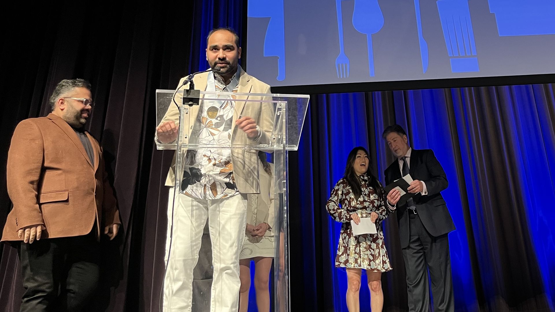 Photo of a man giving a speech 