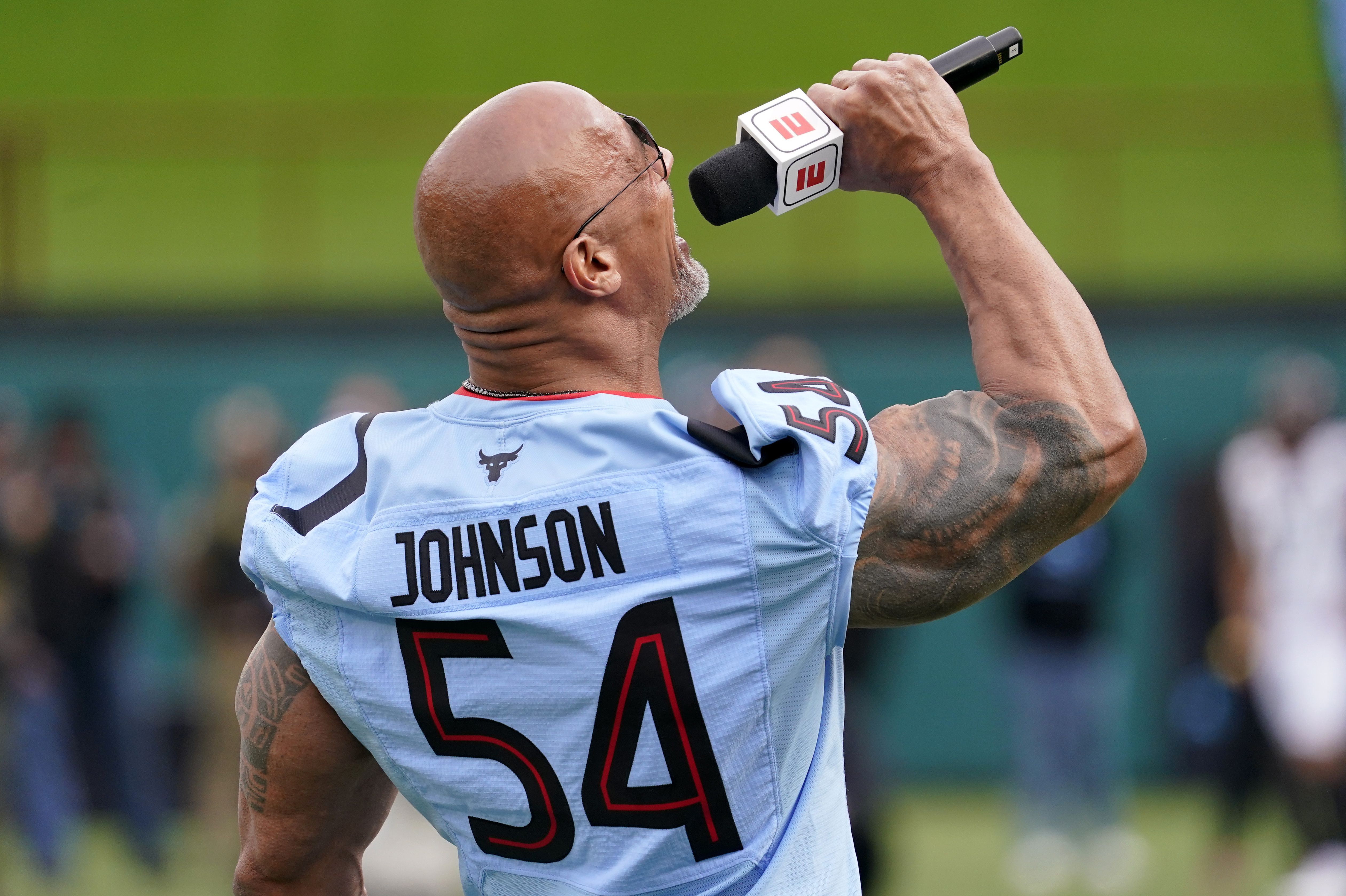 the rock screaming into a mic