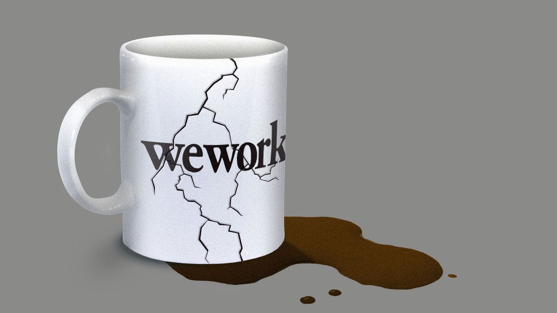 Cracked coffee mug with WeWork logo.