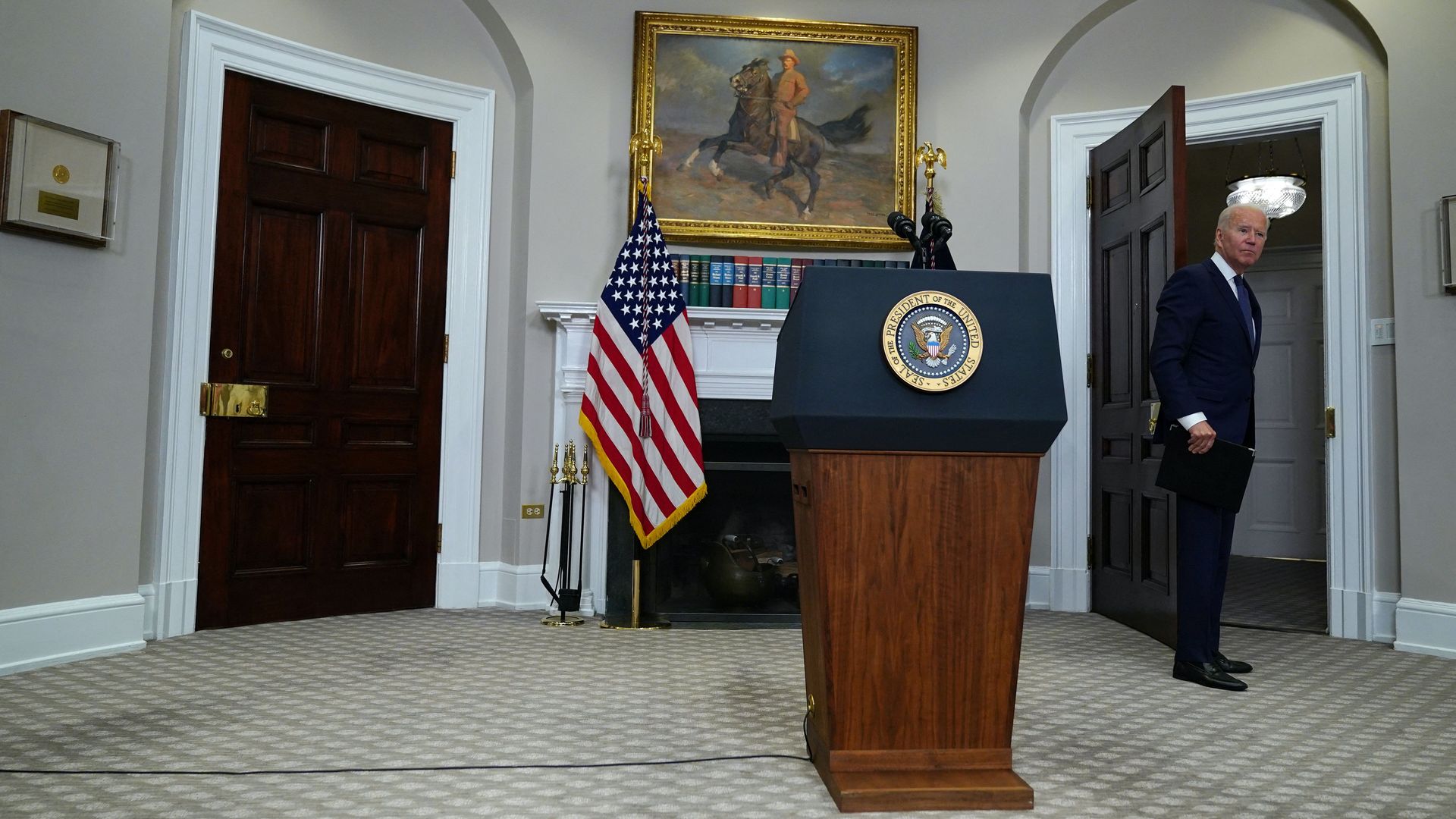 President Biden is seen pausing to answer a reporter's question after making remarks about Afghanistan on Sunday.