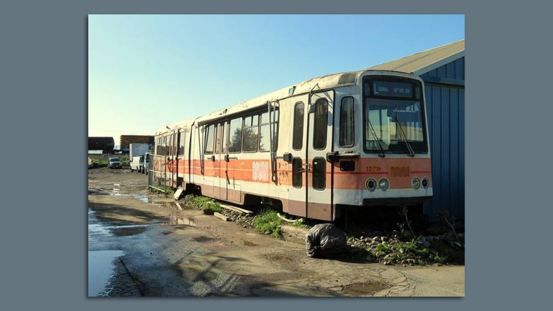The converted Muni streetcar currently resides in a storage lot in Richmond.