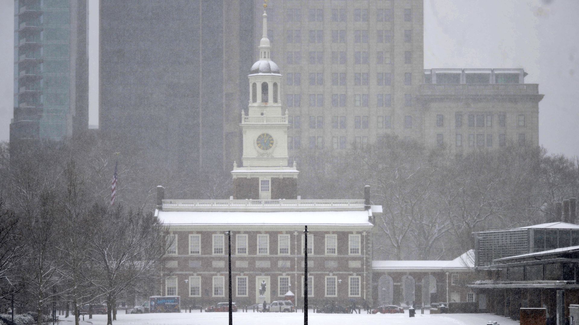 Commuters look to beat rush hour after several inches of snow fell on Philadelphia.