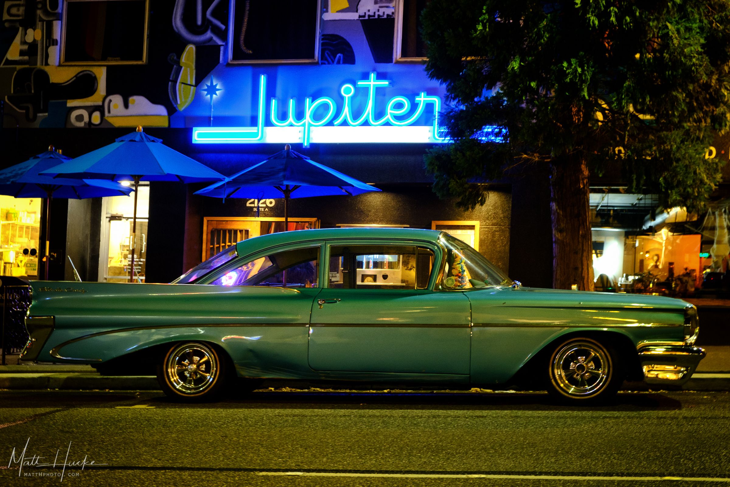 Photo of the neon sign in front of the Jupiter Bar in Seattle.