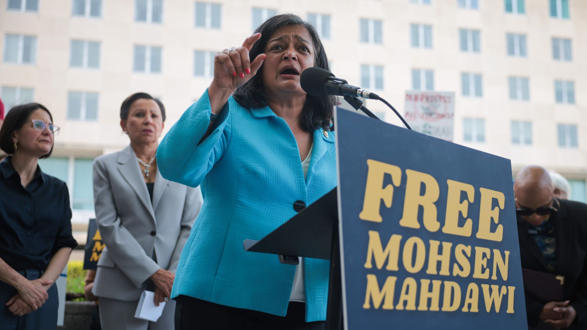 Rep. Pramila Jayapal speaks at a rally to release a student in ICE custody outside the State Department in Washington, DC.