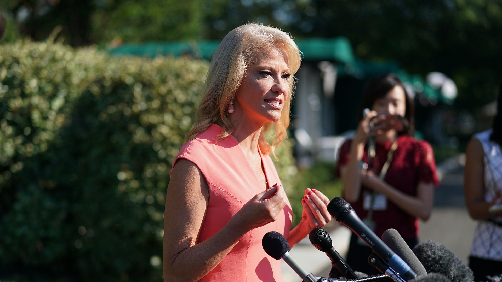 Conway speaking to the press.