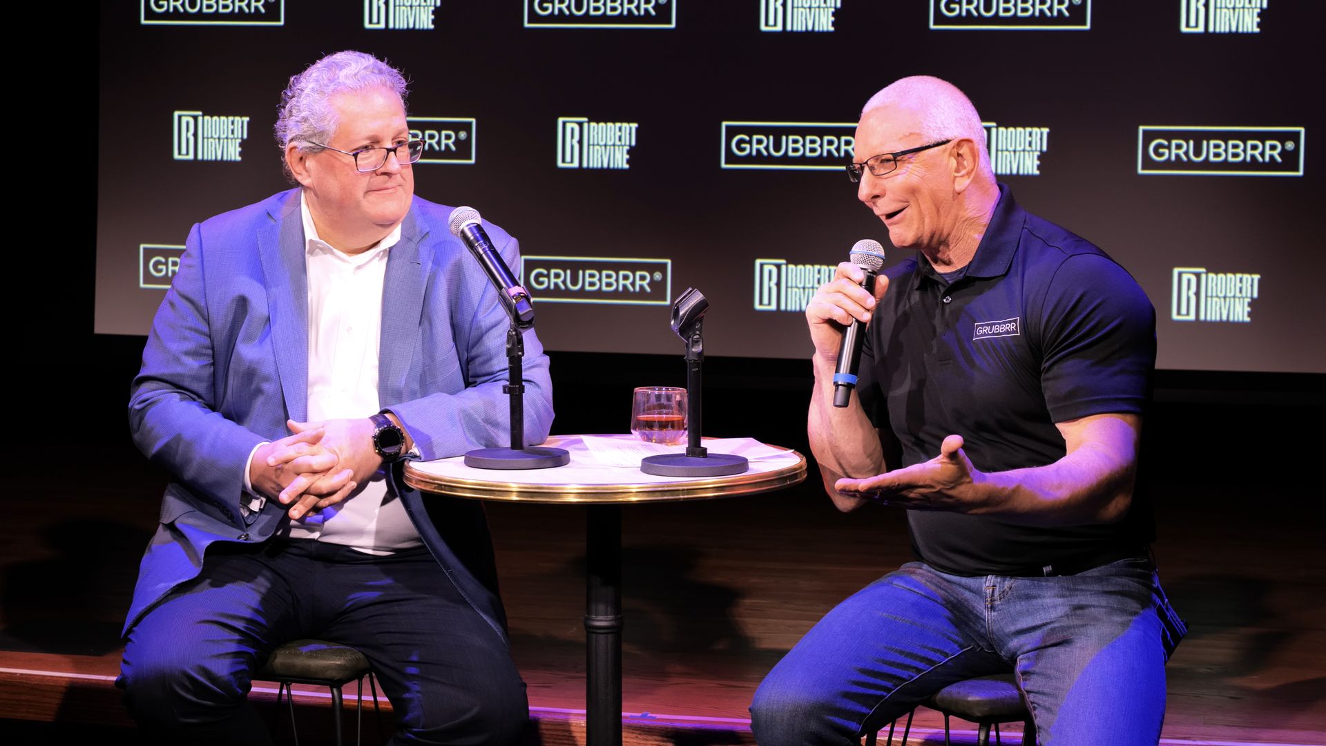 Grubbrr CEO Sam Zietz and Food Network chef Robert Irvine at an event in NYC.